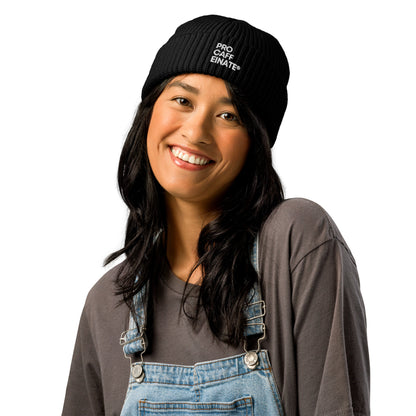 Woman wearing a beanie hat from Procaffeinate coffee